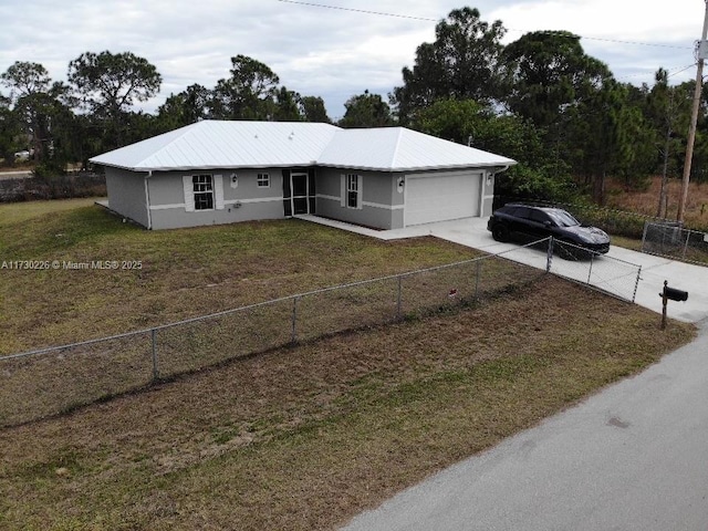 ranch-style house with a garage and a front yard