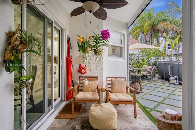 view of patio with ceiling fan