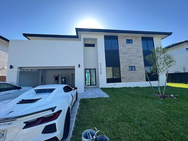 contemporary house with a front lawn