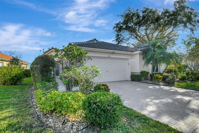 view of side of home featuring a garage