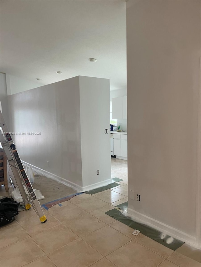 12915 Coral Lakes Dr, Boynton Beach, FL 33437 - empty room featuring light tile patterned floors and baseboards