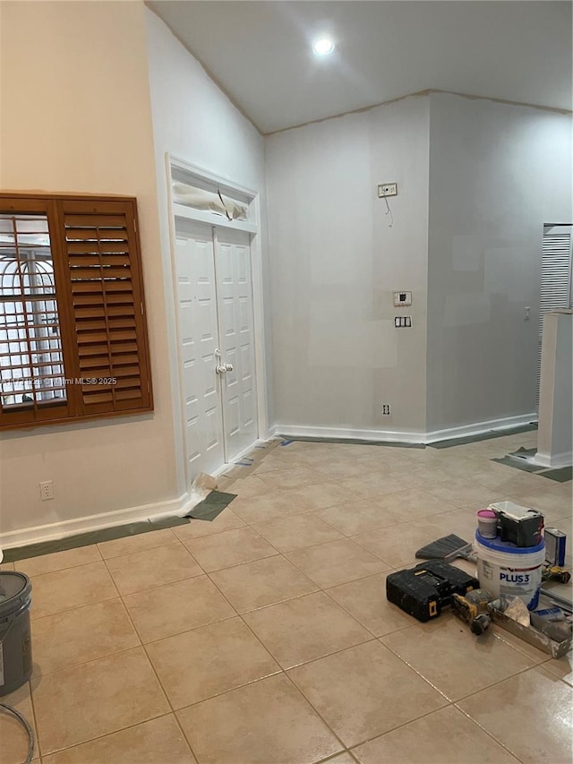 12915 Coral Lakes Dr, Boynton Beach, FL 33437 - tiled empty room with baseboards