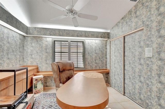 12915 Coral Lakes Dr, Boynton Beach, FL 33437 - home office with ceiling fan, tile patterned floors, and wallpapered walls