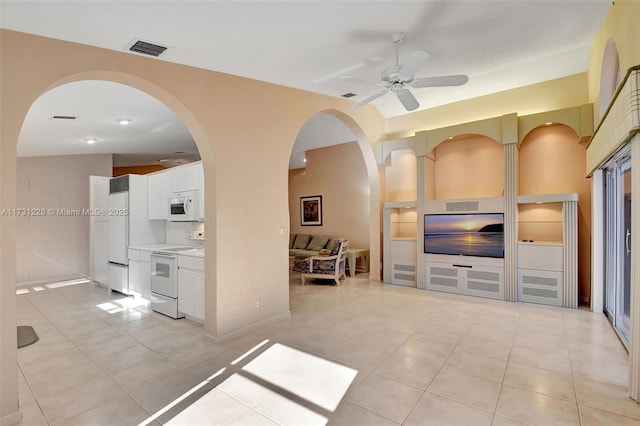 12915 Coral Lakes Dr, Boynton Beach, FL 33437 - living room with light tile patterned floors, ceiling fan, and baseboards