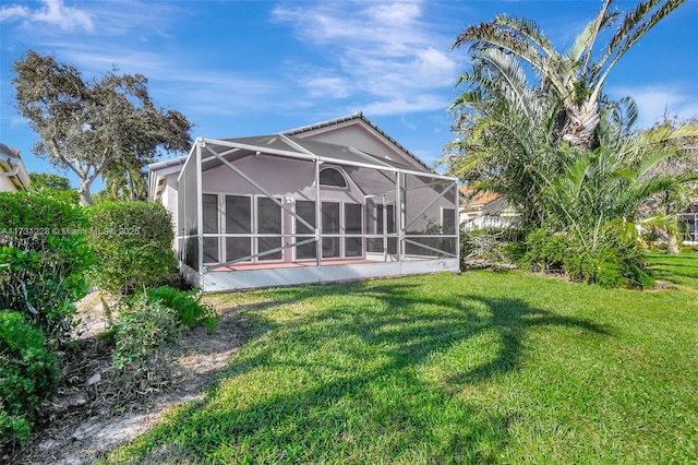 12915 Coral Lakes Dr, Boynton Beach, FL 33437 - back of house featuring a yard and a lanai
