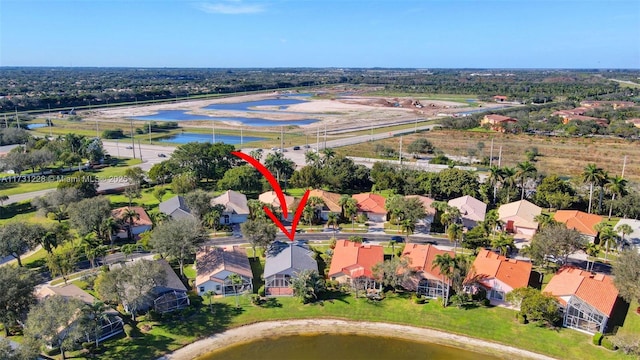 12915 Coral Lakes Dr, Boynton Beach, FL 33437 - aerial overview of property's location with a nearby body of water and nearby suburban area