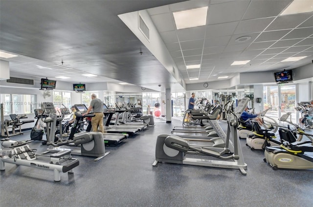 12915 Coral Lakes Dr, Boynton Beach, FL 33437 - exercise room featuring a paneled ceiling and healthy amount of natural light