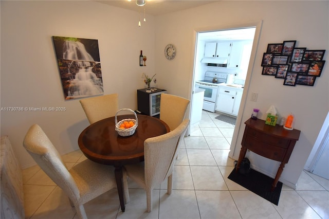 dining space with light tile patterned floors