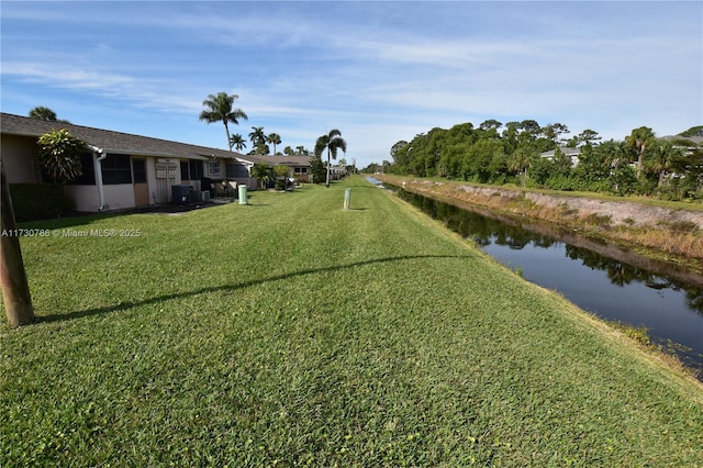 view of yard with a water view