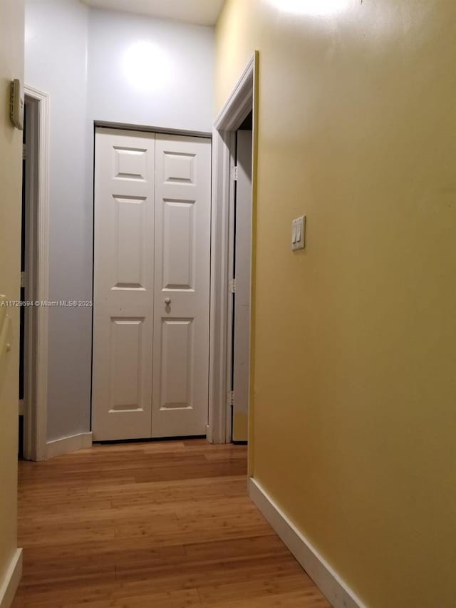 hallway featuring light wood-type flooring