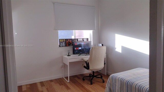 home office featuring light hardwood / wood-style flooring