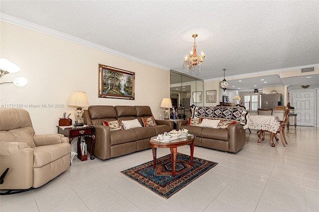 tiled living room featuring ornamental molding, a notable chandelier, and a textured ceiling