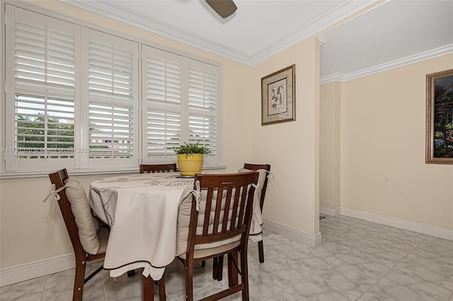 dining room featuring ornamental molding