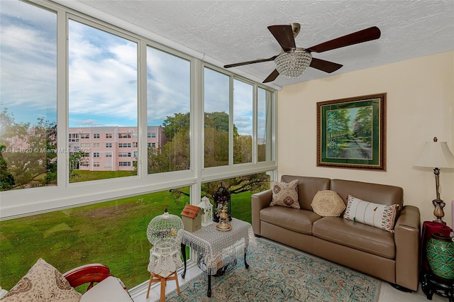 sunroom / solarium with ceiling fan