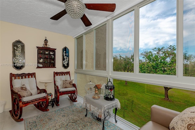 sunroom / solarium with ceiling fan