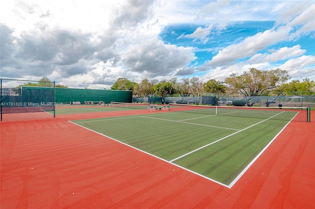 view of tennis court with basketball court