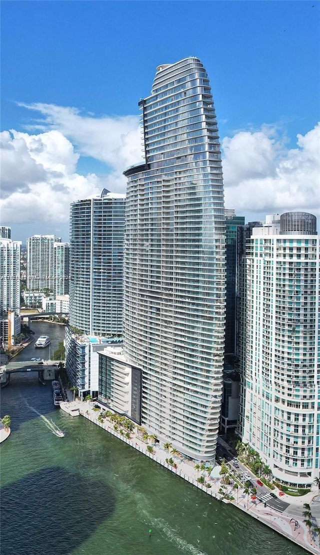 view of building exterior with a water view