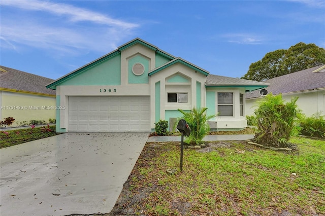 view of front of property with a garage