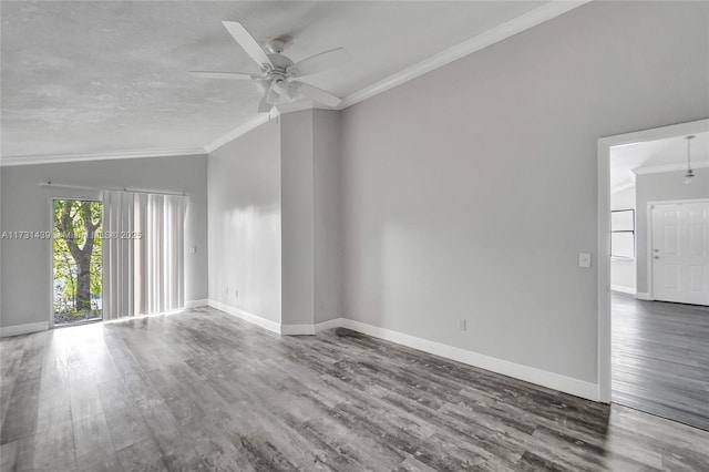 unfurnished room featuring ceiling fan, hardwood / wood-style floors, ornamental molding, a textured ceiling, and vaulted ceiling