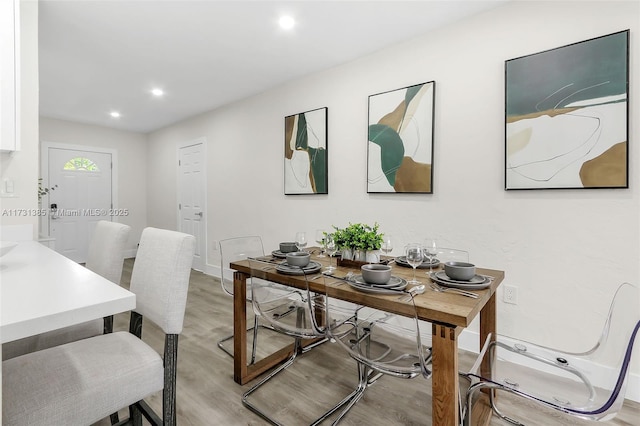 office space with light hardwood / wood-style flooring