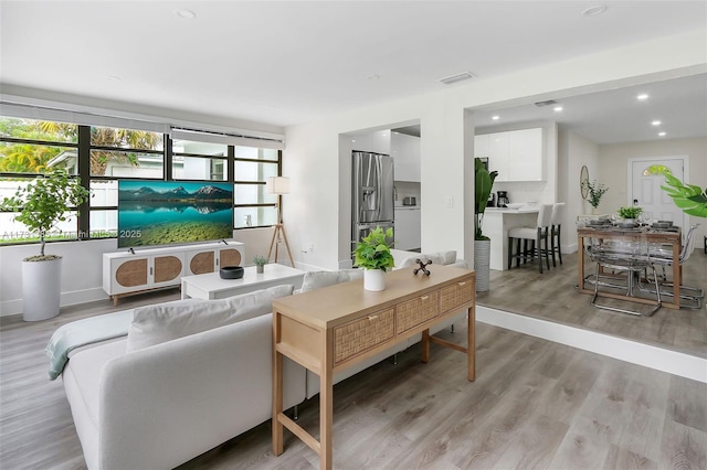 living room featuring light hardwood / wood-style flooring