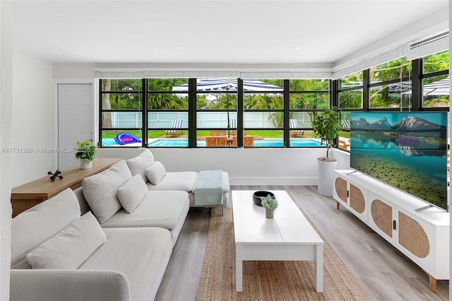 sunroom / solarium with plenty of natural light