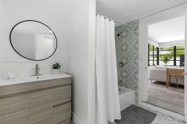 bathroom with vanity and shower / tub combo