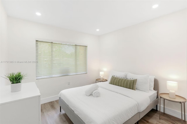 bedroom featuring light hardwood / wood-style flooring