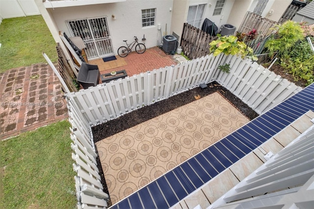 view of patio featuring central AC unit