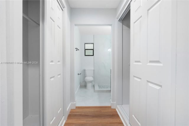 hall featuring hardwood / wood-style floors