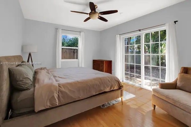 bedroom with hardwood / wood-style flooring and ceiling fan