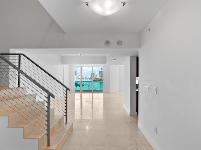 hallway with light tile patterned flooring