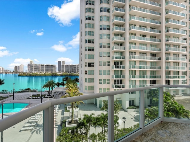 balcony featuring a water view