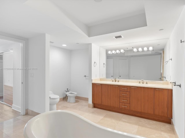 bathroom with a bidet, tile patterned flooring, vanity, a bath, and toilet