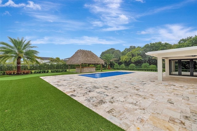 view of swimming pool with a gazebo, french doors, a patio area, and a lawn