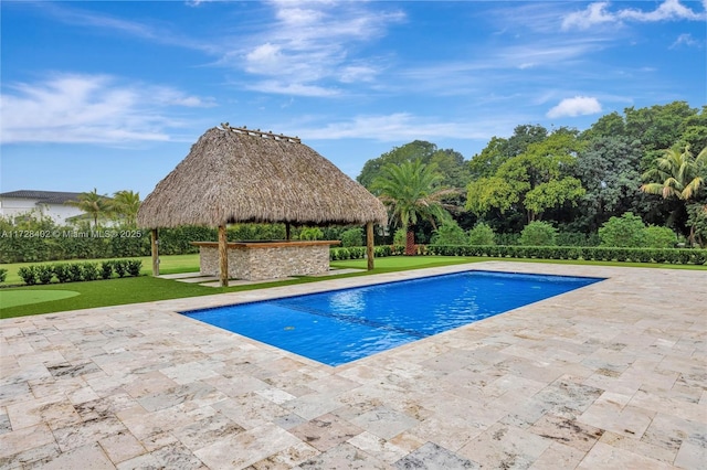 view of swimming pool featuring a gazebo, a yard, and a patio area