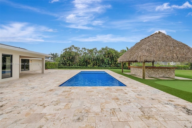 view of pool featuring a gazebo and a patio area