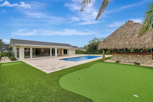 view of swimming pool with a patio area