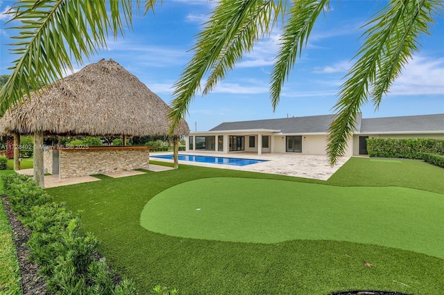 view of swimming pool with a gazebo, a yard, and a patio area