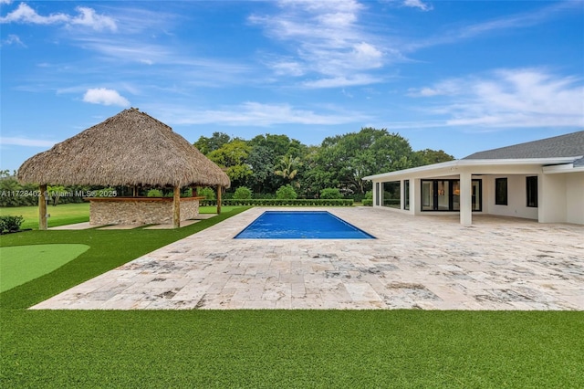 view of pool featuring a gazebo, a yard, and a patio area