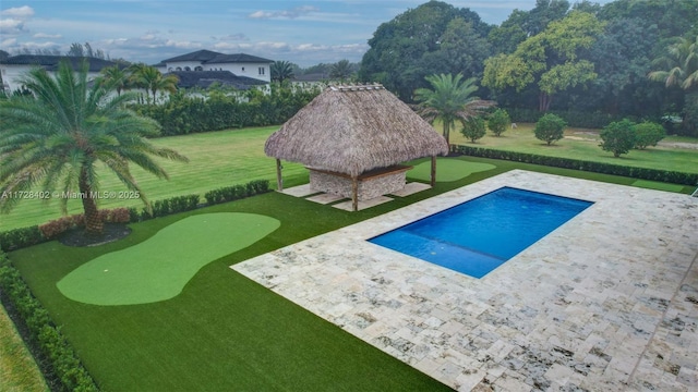 view of pool featuring a gazebo, a patio area, and a lawn