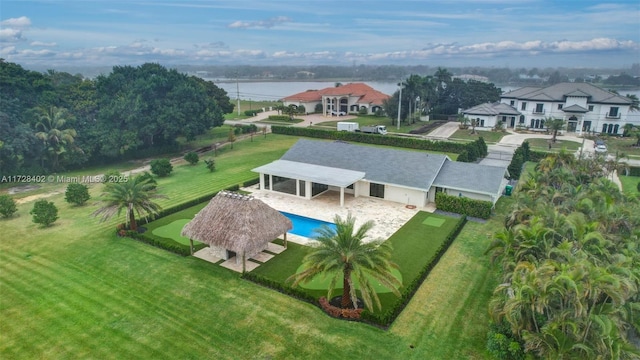 birds eye view of property featuring a water view