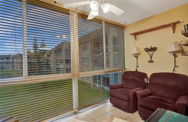 sunroom / solarium with ceiling fan