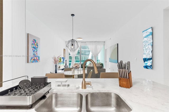 kitchen with sink and pendant lighting