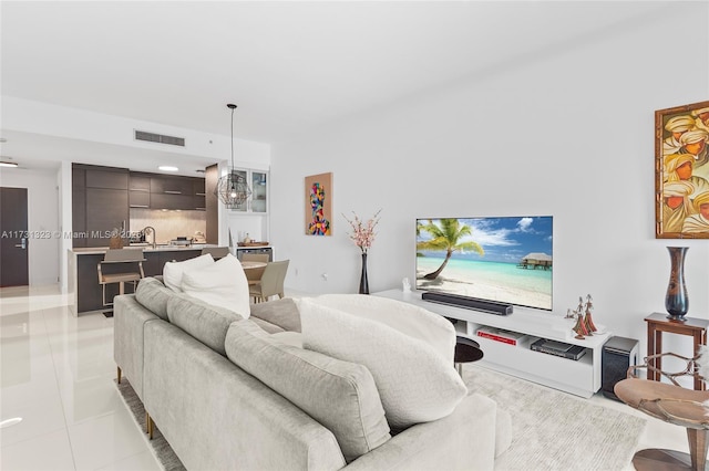 living room featuring light tile patterned floors