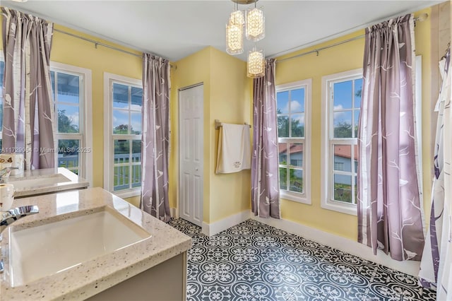 bathroom with vanity and tile patterned floors