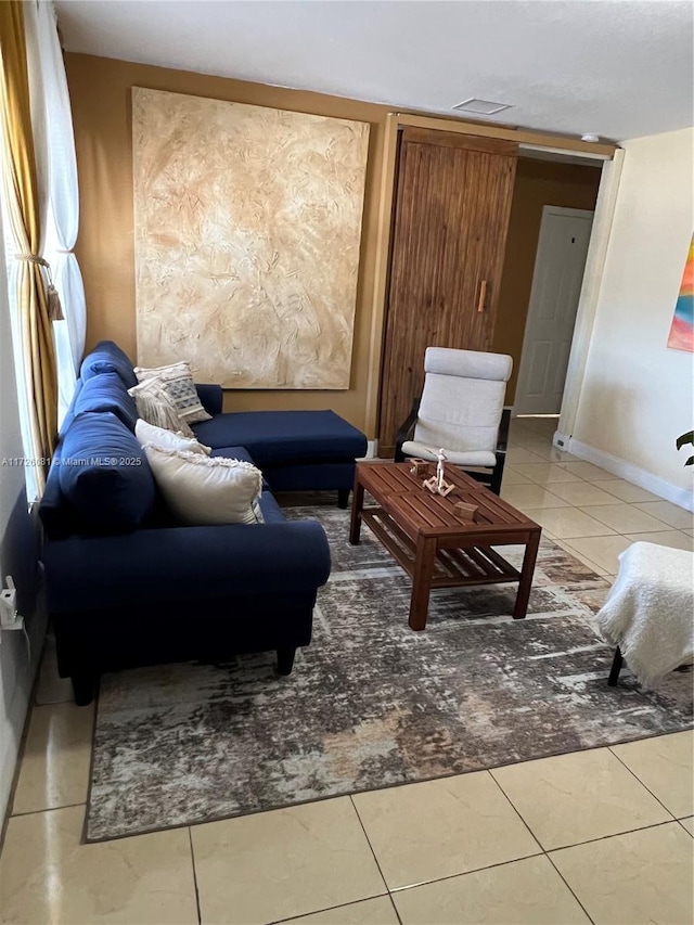 living room featuring tile patterned floors