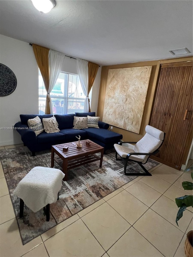 living room featuring tile patterned flooring