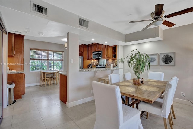 dining area featuring ceiling fan