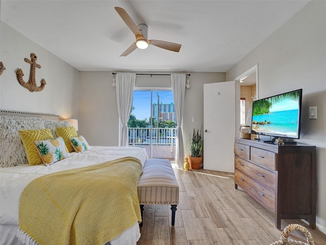 bedroom with access to outside, light hardwood / wood-style floors, and ceiling fan